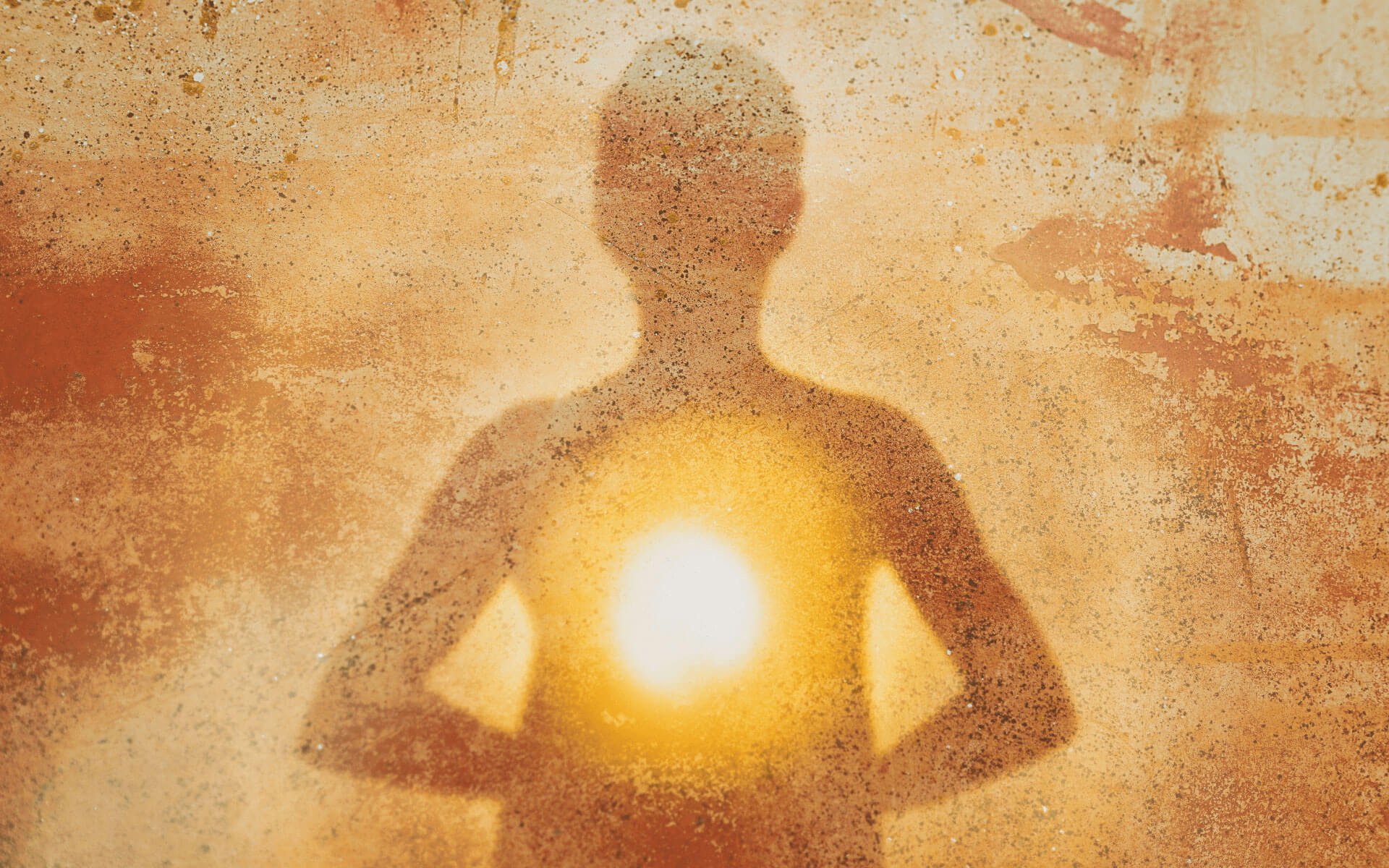 Shadow image of a person with a healing light in their middle