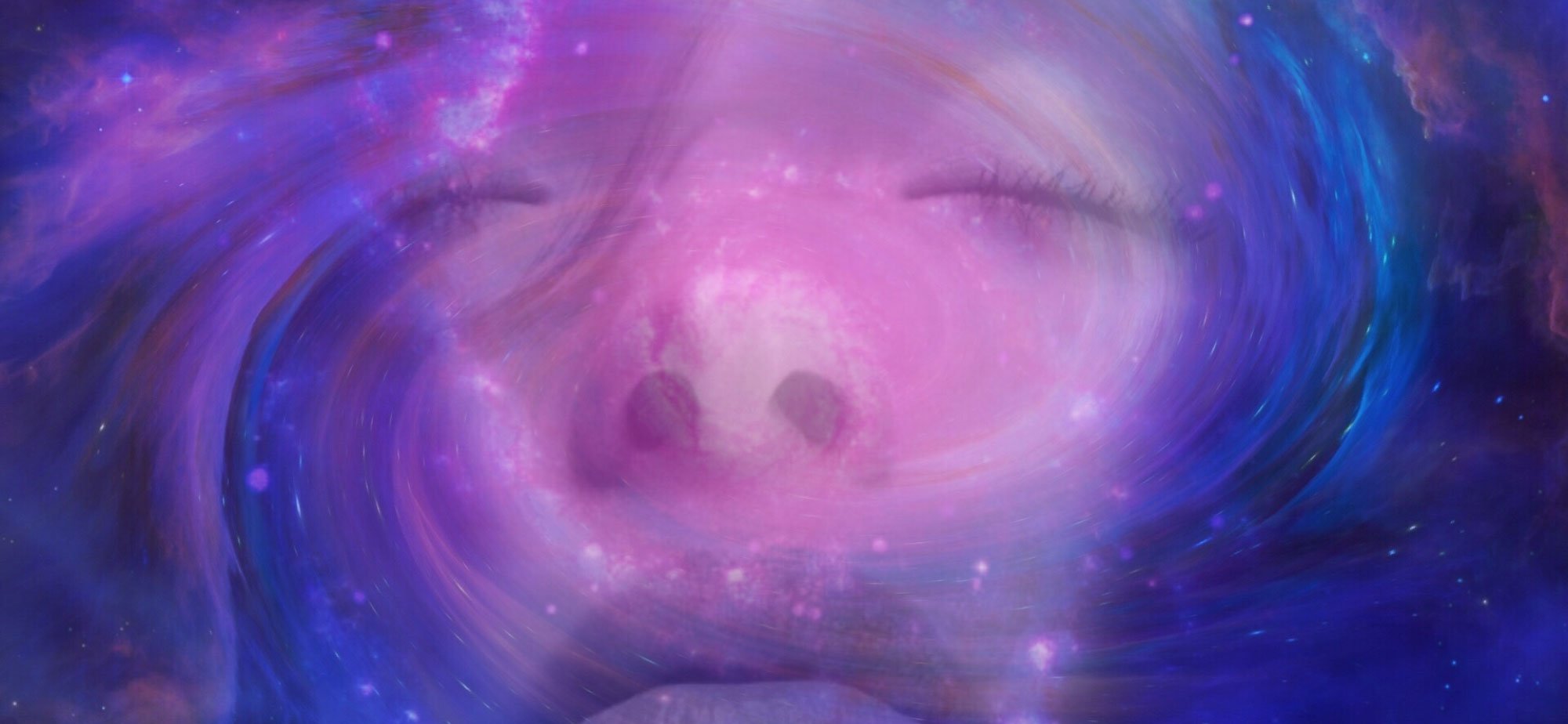 Closeup of a face of a woman with her eyes closed, encased in a swirl of purple sparkly energy